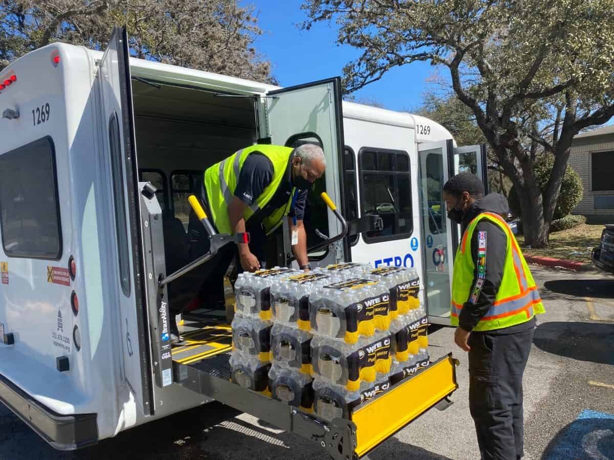 Drivers loading donated water bottles for Capital Metro. In partnership with Austin Capital Metro, MTM Transit stepped up to deliver bottled water in the aftermath of the 2021 Austin winter storm.
