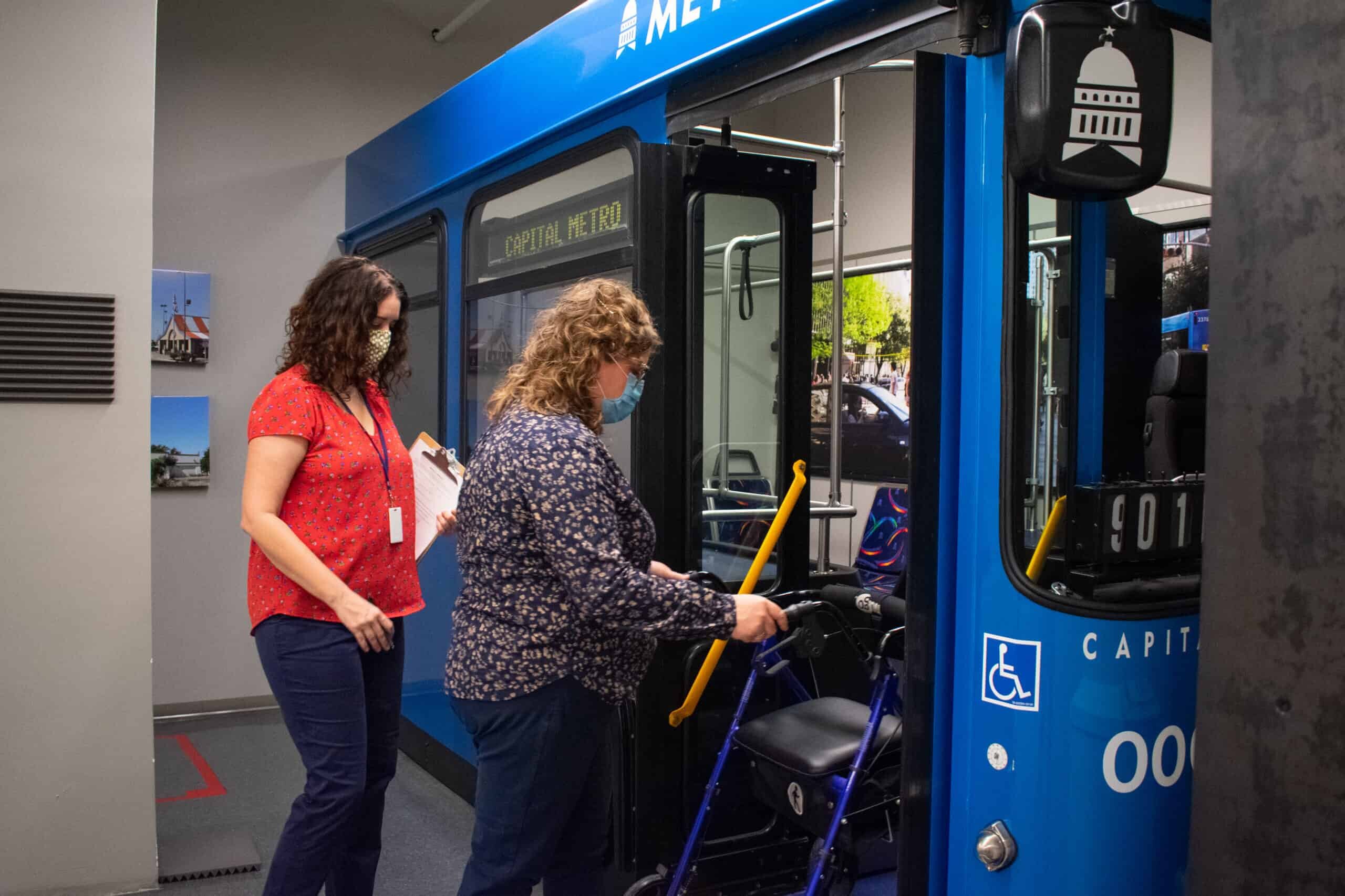 An MTM Transit assessment evaluator watches a paratransit applicant board a mock bus. Following six-plus years of partnership, MTM Transit and Capital Metro are continuing our collaboration for ADA paratransit eligibility.