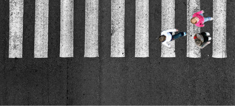 Kids crossing on a crosswalk