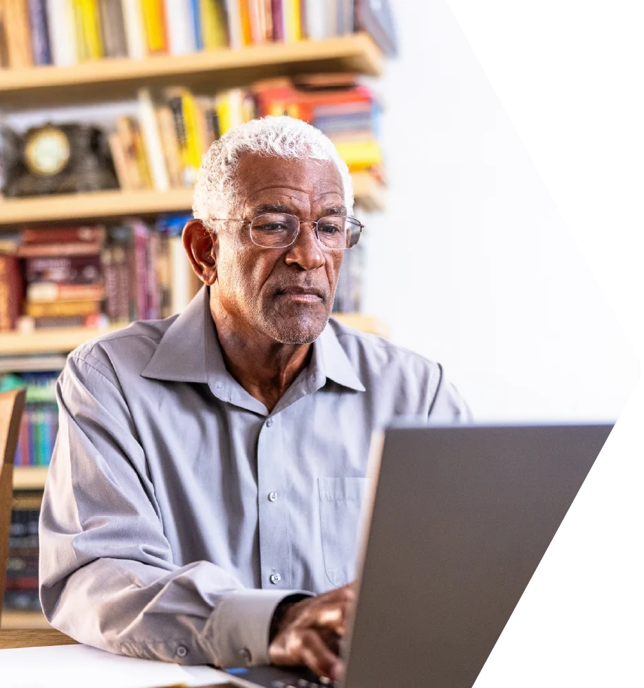 Senior man using a laptop