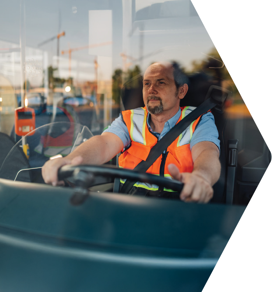 Bus driver wearing a safety vest