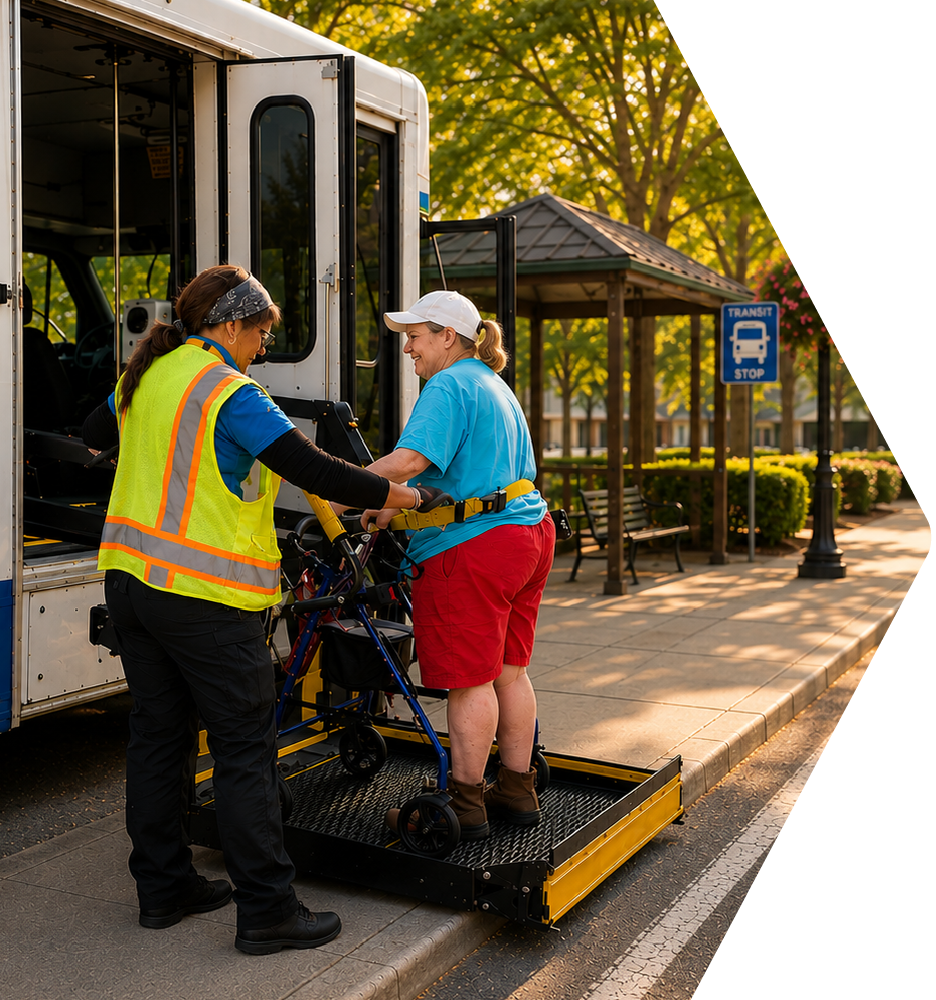 Driver raising passenger up on the bus lift